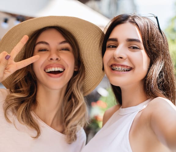 Friends out in public taking a selfie